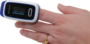 User measures his vital signs with the fingertip pulse oximeter HbO-Smart 